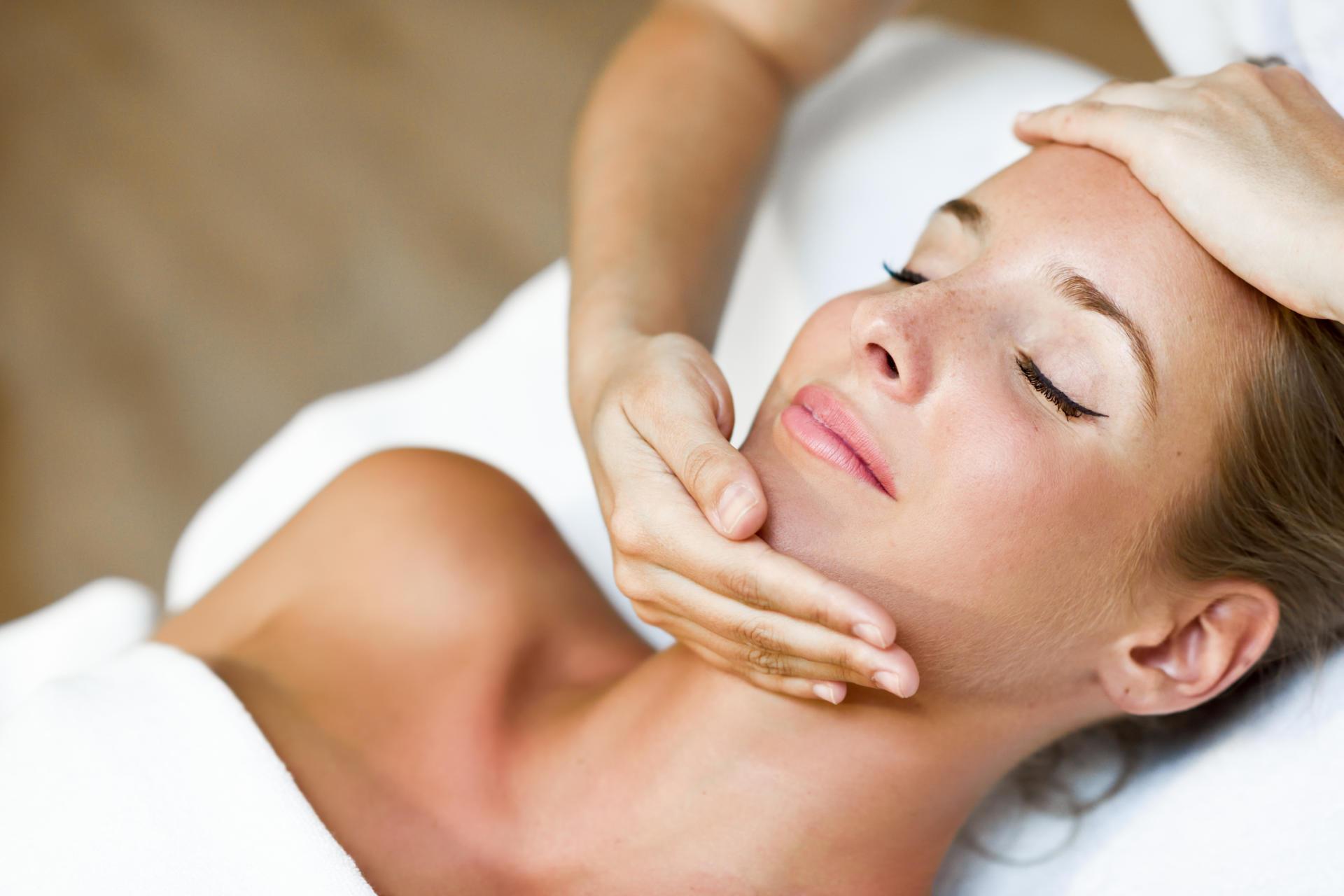 young-woman-receiving-head-massage-spa-center.jpg